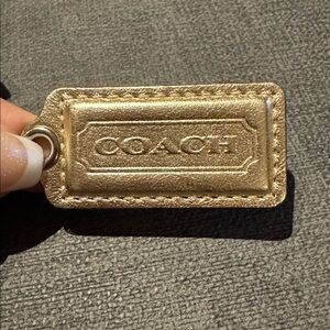 Coach GOLD METALLIC LEATHER hang tag